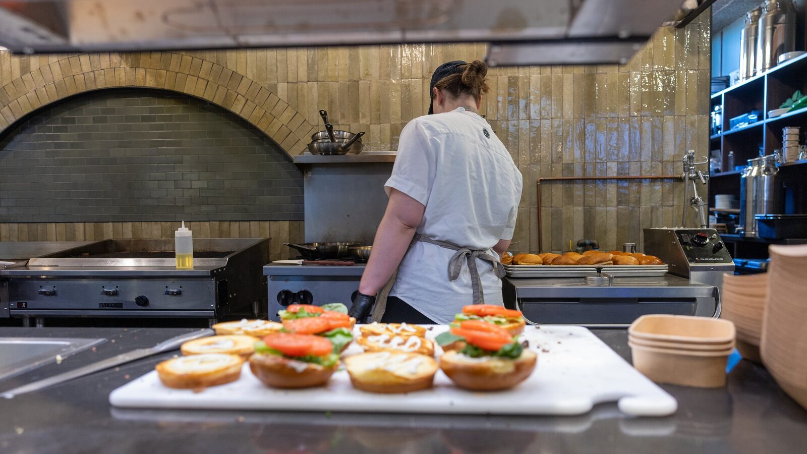 A chef at the hearth oven at Harvey's