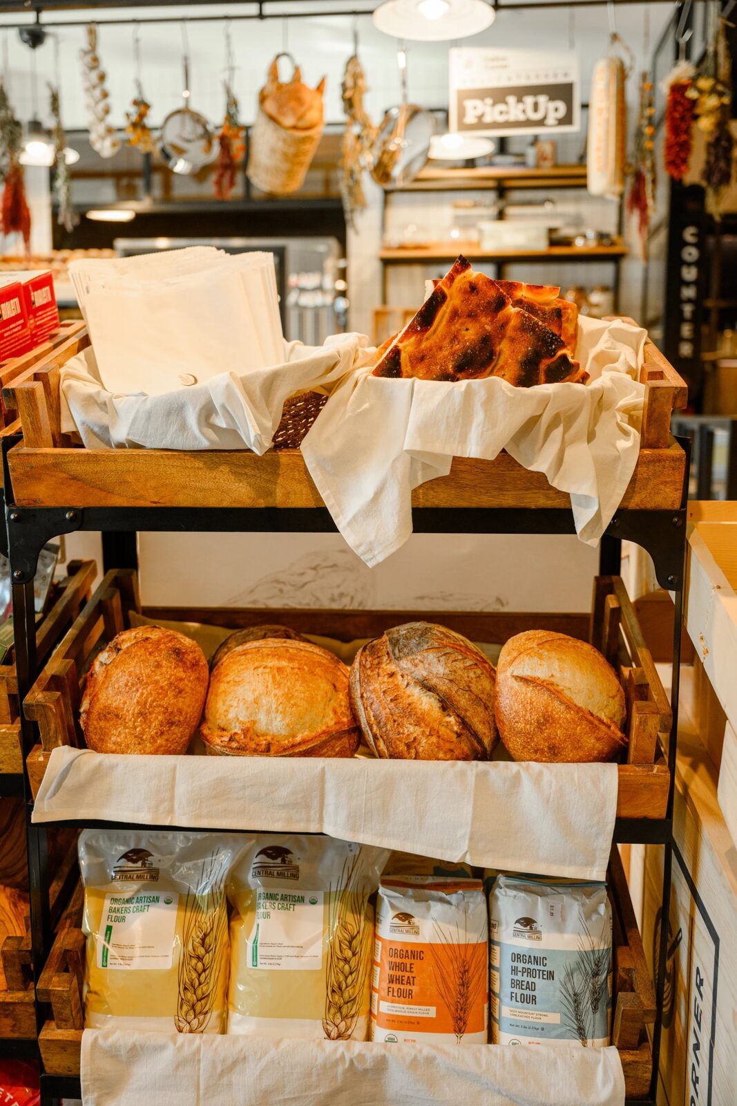 Fresh-baked sourdough loaves on the shelf
